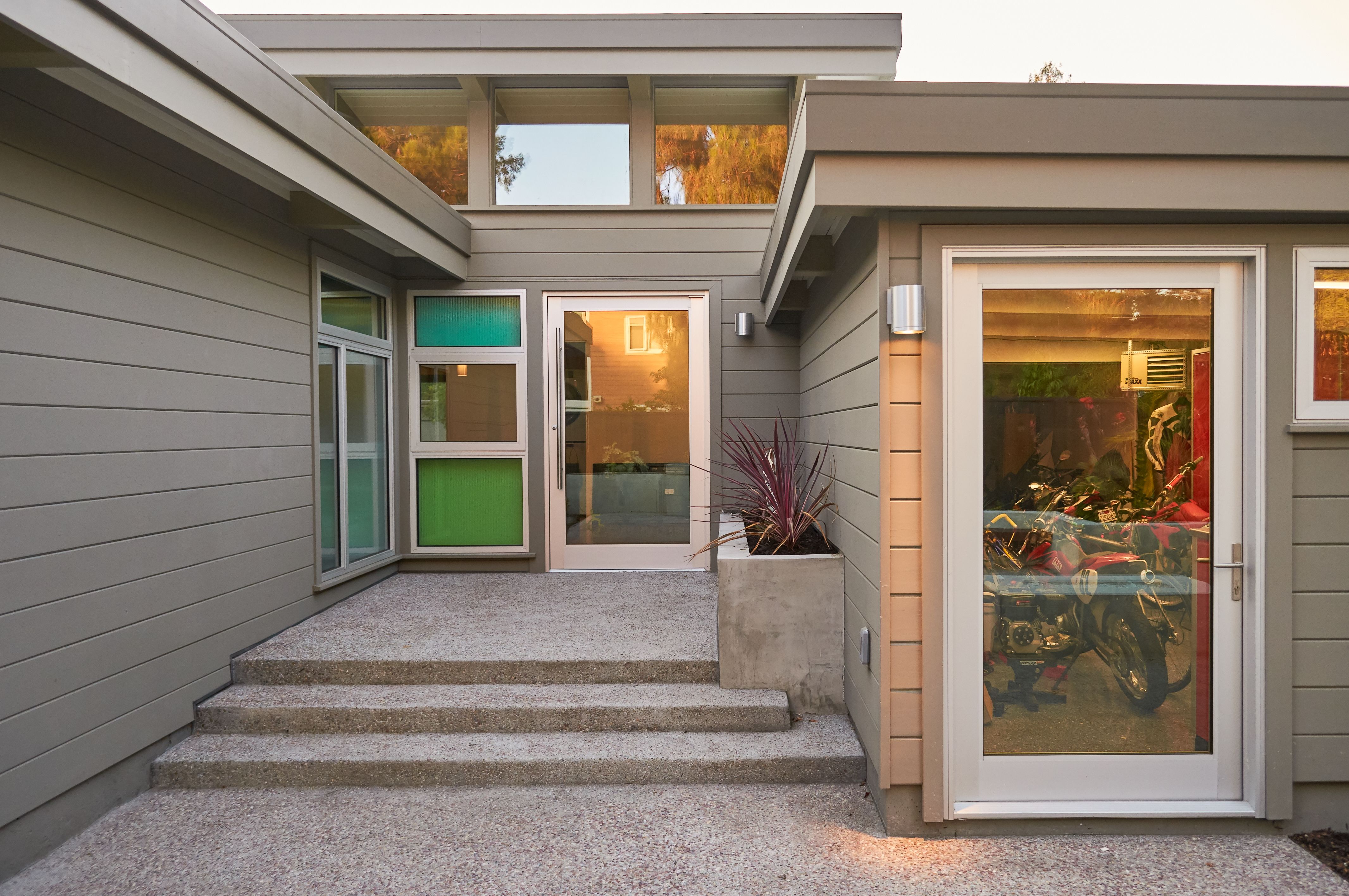 Not Sure If You Should Maintain or Upgrade Your Eichler Home? Retain the Original Vision with Expert Home Remodeling As an Eichler homeowner, you may be skeptical about renovations because you are anxious to preserve the original look of your home. A deteriorating façade can, however, increase your maintenance expenses every year. With rising home prices and the growing trend towards generational living, you may want to increase the existing interior space. Perhaps you dream of a modern kitchen and luxurious bathroom—two remodeling projects that provide greater comfort and significant returns on your investment. If you are trying to decide whether to maintain or upgrade your Eichler home, here is a quick overview of important dos and don’ts outlined in an eichlernetwork.com article. Eichler Home Maintenance and Renovation Guidelines • Replace old fencing: A rotting and sinking fence is unattractive and unsafe. Retaining the distinctive Eichler look can be a bit of a challenge. Homeowners who have walked the fine line suggest using the carport as inspiration. Mimicking the glass inserts, for instance, can give a sophisticated appearance. You may choose a cedar fence with bamboo posts for a rustic look. • Replace old siding: Repainting or staining worn out siding is just a temporary solution. The three most common types of Eichler style siding are available at eichlersiding.com. The company also offers custom solutions to replicate the specific type your home needs. • Restore exterior lighting fixtures: A light sandblasting can remove the dirt and corrosion from your anodized aluminum fixtures. Powder-coating or re-anodizing will restore them beautifully. You may want to consider adding motion sensors for enhanced security. Keep in mind that if the corrosion is severe, re-anodization might give mixed results. If so, look for contemporary lights that will blend nicely with the Eichler design. • Change the old front door: Finding the right replacement for your front or garage door is challenging. To upgrade the look without taking away from the Eichler charm, architects recommend custom doors. It is also possible to automate your original garage doors with electronic sensors. Except when broken, it is not necessary to replace them. • Aim for an integrated look with your home addition: This is perhaps the hardest part of any Eichler home renovation project. Inappropriate remodels not only look out of place, they will also lower your property value. It is best to hire a professional home remodeling contractor with extensive knowledge of Eichler designs. Eichler Home Remodeling Specialists At Flegel’s Construction Co., we work hard to exceed your expectations of workmanship and service quality. As Eichler home renovation specialists, we create a harmonious blend of past and present. You can count on us to preserve the unique, mid-century architectural features of your home while giving it a modern touch. We are happy to work with your designer/architect to ensure your Eichler home renovation project is a success. These testimonials from our happy clients in Silicon Valley including Palo Alto, Los Altos, San Jose, Cupertino, Mountain View, CA, speak for our quality. Call 408-269-1101 or contact us online to learn more about how to maintain or upgrade your Eichler home.